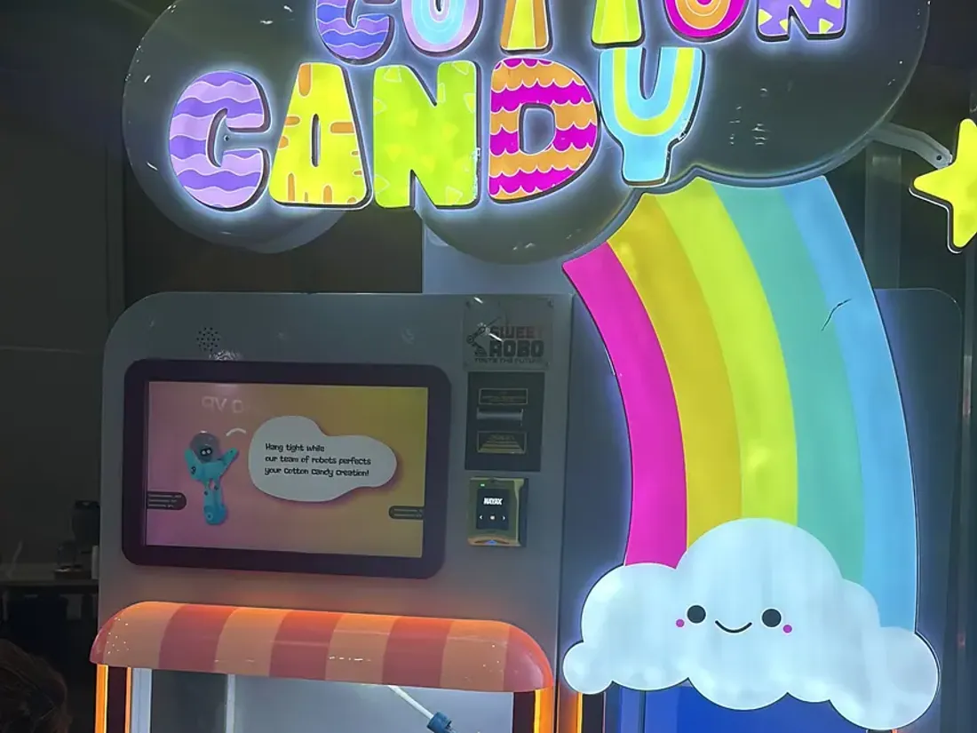 Sweet Robo cotton candy vending machine installed at a European arcade