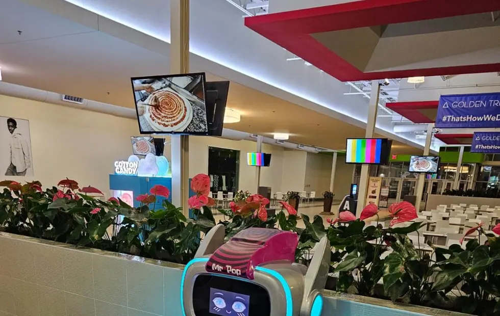Mr.-Pop-Popcorn-Roboter mit Kunden